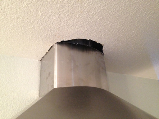 patching ceiling drywall next to range hood exhaust duct